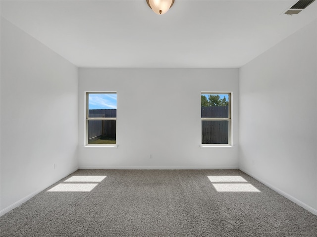 empty room featuring carpet floors