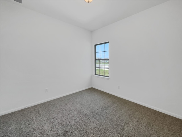 unfurnished room with carpet floors