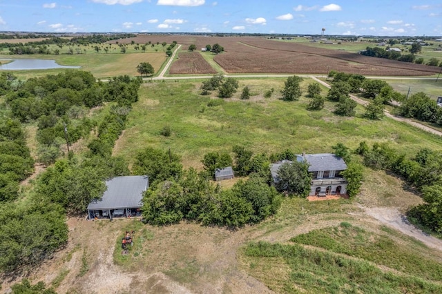 bird's eye view with a water view and a rural view