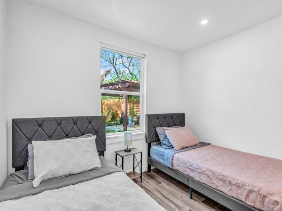 bedroom featuring light wood-type flooring