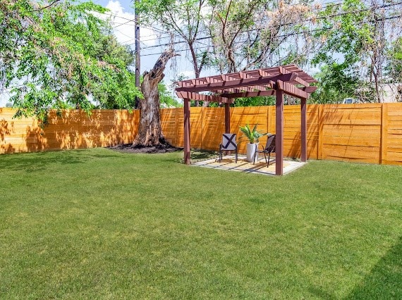 view of yard with a pergola