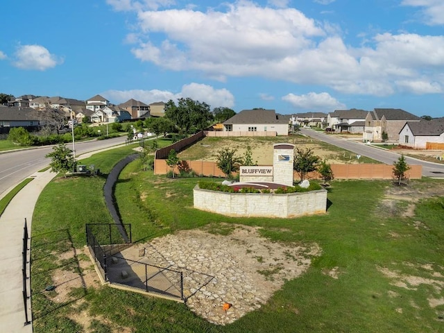 view of community featuring a yard