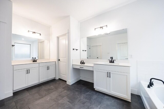 bathroom featuring a bath and vanity