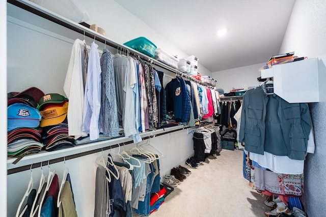 spacious closet with carpet floors