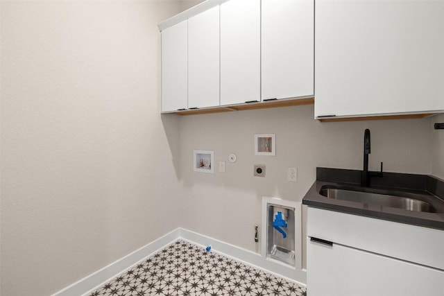 laundry area featuring sink, cabinets, electric dryer hookup, gas dryer hookup, and hookup for a washing machine