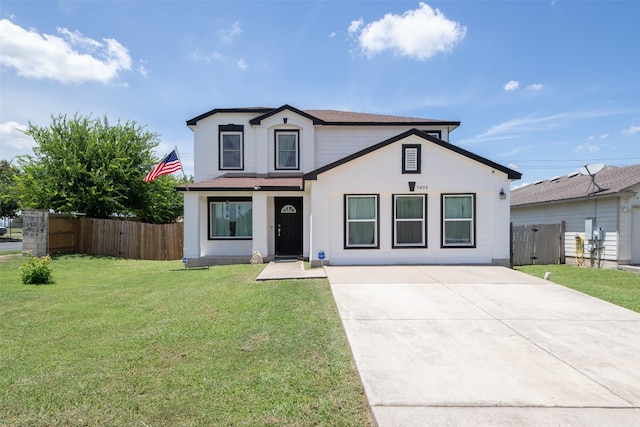 view of front property featuring a front lawn