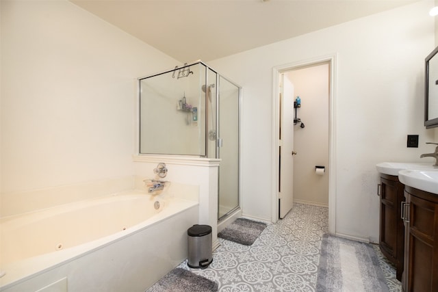 bathroom with separate shower and tub and vanity