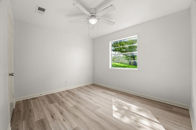 unfurnished room with ceiling fan and light hardwood / wood-style flooring