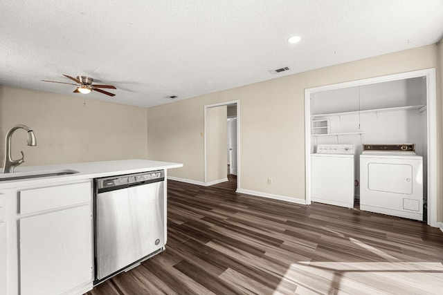 kitchen featuring sink, white cabinetry, dishwasher, dark hardwood / wood-style floors, and separate washer and dryer