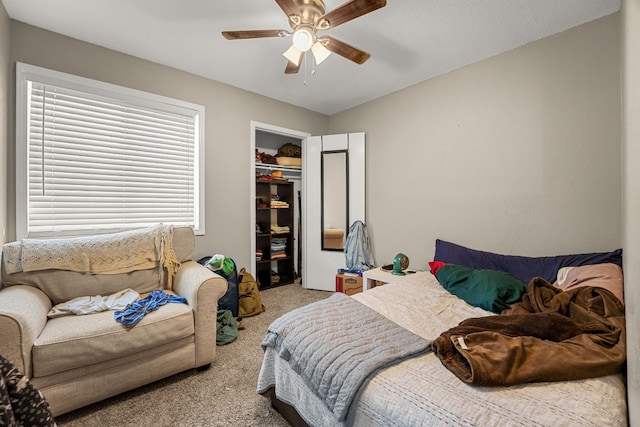 bedroom featuring carpet floors, a closet, and ceiling fan