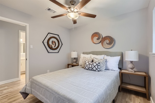 bedroom featuring ceiling fan and light hardwood / wood-style floors