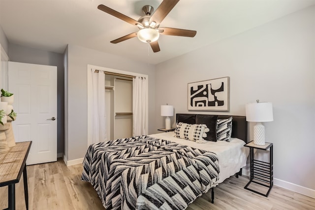 bedroom with ceiling fan and light wood-type flooring