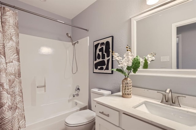 full bathroom featuring shower / bath combo with shower curtain, vanity, and toilet