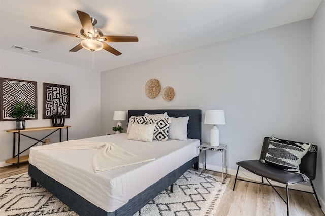 bedroom featuring ceiling fan and light wood-type flooring