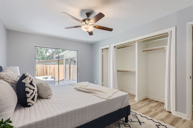 bedroom featuring access to outside, ceiling fan, a closet, and light hardwood / wood-style floors