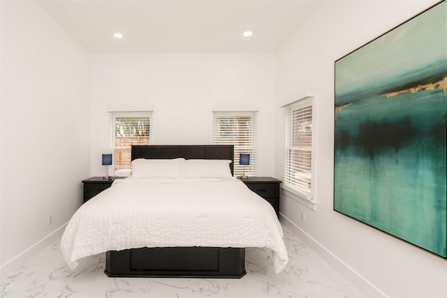 bedroom featuring light tile patterned floors