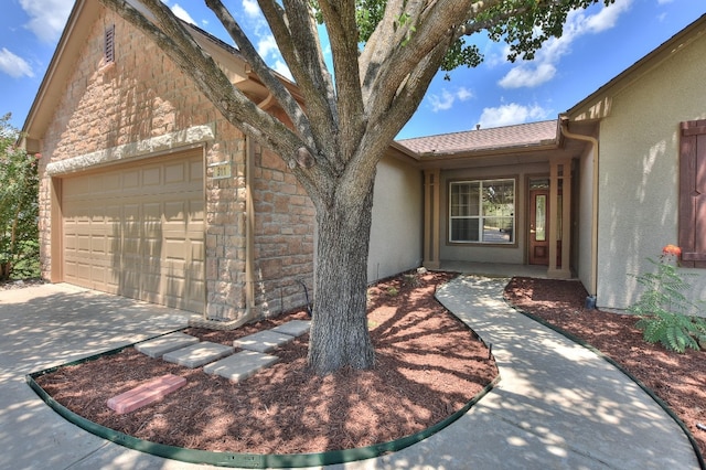 property entrance with a garage