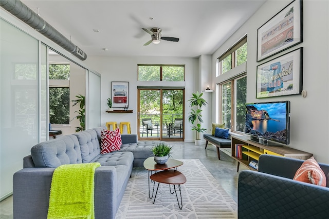 living room featuring ceiling fan