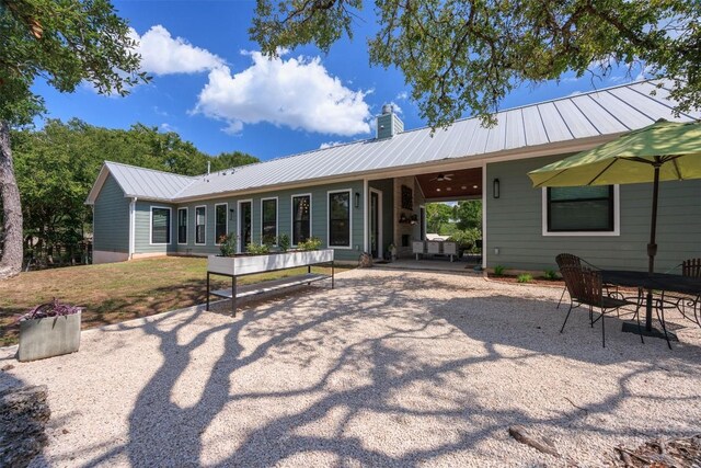 back of property featuring a patio area