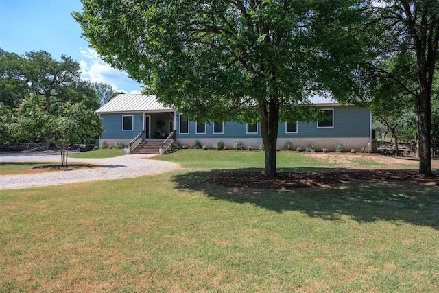 view of front of home with a front yard