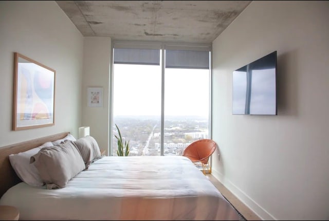 bedroom with expansive windows