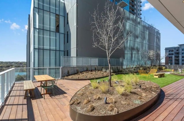 48 E Ave Unit 2405, Austin, TX 78701 - view of home's community featuring a deck and outdoor dining area