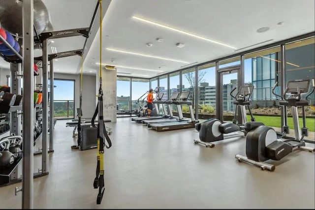 48 E Ave Unit 2405, Austin, TX 78701 - workout area with floor to ceiling windows and a city view
