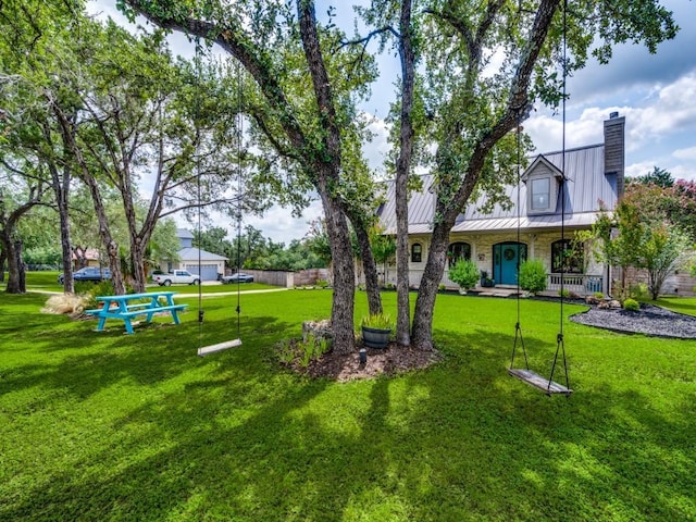 view of yard with covered porch