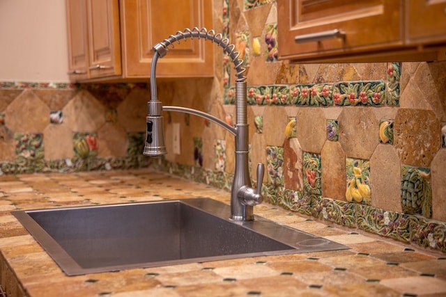room details with sink and decorative backsplash