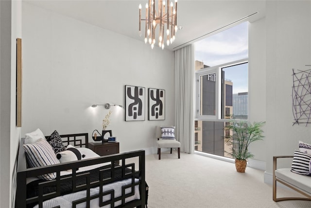 interior space featuring a notable chandelier and carpet floors