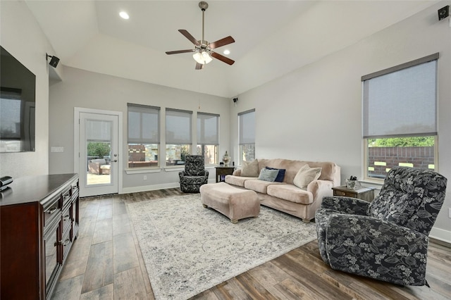 living room with wood-type flooring, plenty of natural light, and ceiling fan