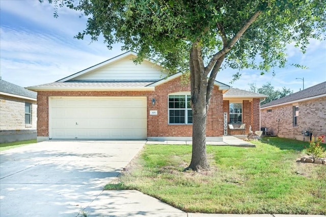 ranch-style house featuring a garage and a front yard