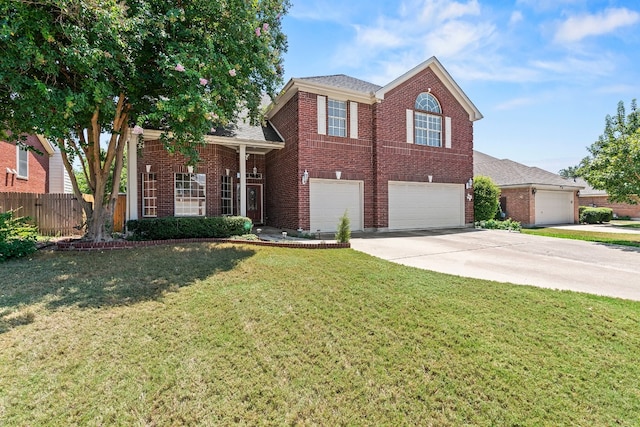 view of front of house with a front lawn and a garage