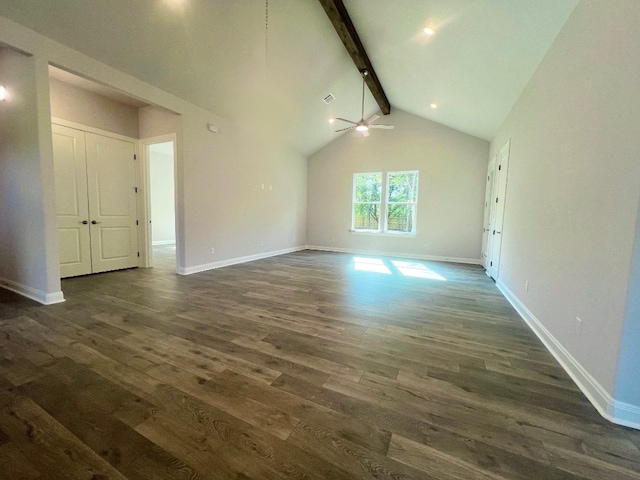 unfurnished living room featuring ceiling fan, dark hardwood / wood-style flooring, and vaulted ceiling with beams