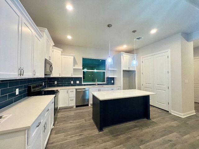 kitchen featuring visible vents, electric stove, dark wood-style flooring, open shelves, and stainless steel dishwasher