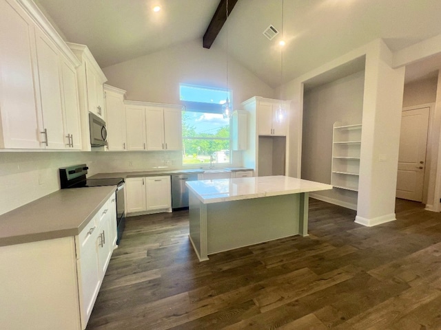 kitchen featuring black appliances, white cabinets, dark hardwood / wood-style floors, and a center island