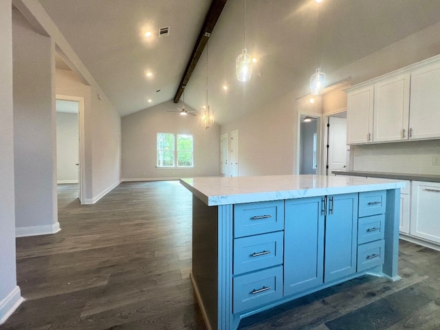 kitchen with hanging light fixtures, dark wood-type flooring, white cabinets, beamed ceiling, and a center island