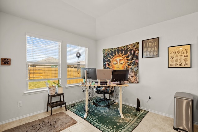 office featuring light tile patterned flooring and a wealth of natural light