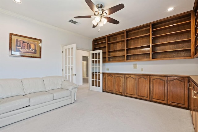 5913 Doone Valley Ct, Austin, TX 78731 - unfurnished living room with french doors, ornamental molding, ceiling fan, light colored carpet, and recessed lighting
