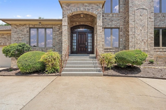 5913 Doone Valley Ct, Austin, TX 78731 - property entrance featuring brick siding