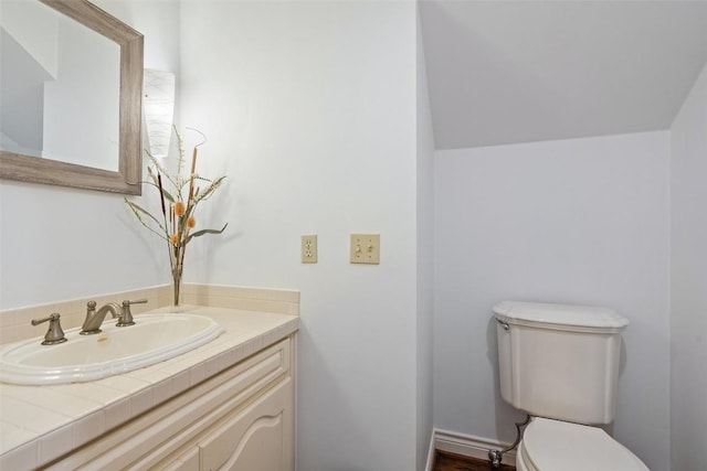 5913 Doone Valley Ct, Austin, TX 78731 - half bathroom featuring toilet and vanity