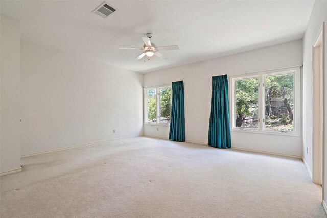 5913 Doone Valley Ct, Austin, TX 78731 - spare room featuring a ceiling fan and light colored carpet