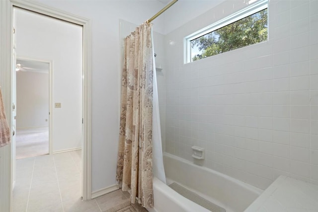 5913 Doone Valley Ct, Austin, TX 78731 - bathroom with tile patterned floors, shower / bath combo with shower curtain, and a ceiling fan