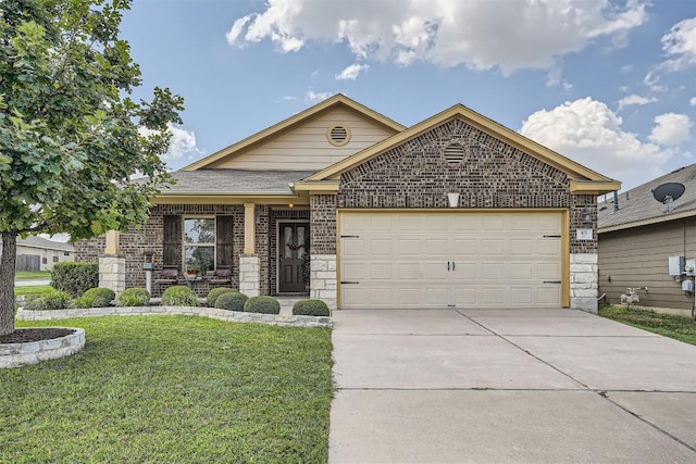 view of front of property featuring a garage and a front lawn