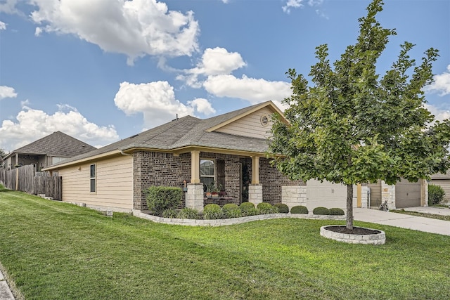 view of front of home with a garage, covered porch, and a front yard