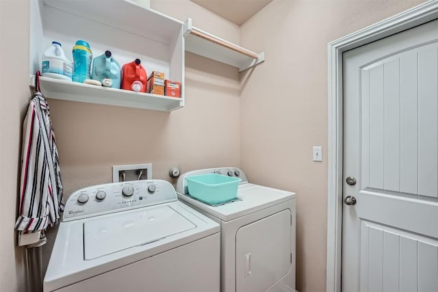 clothes washing area featuring washing machine and dryer