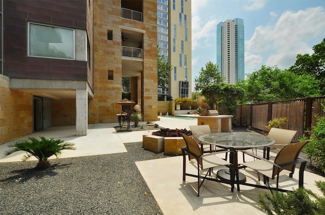 view of patio / terrace featuring a fire pit