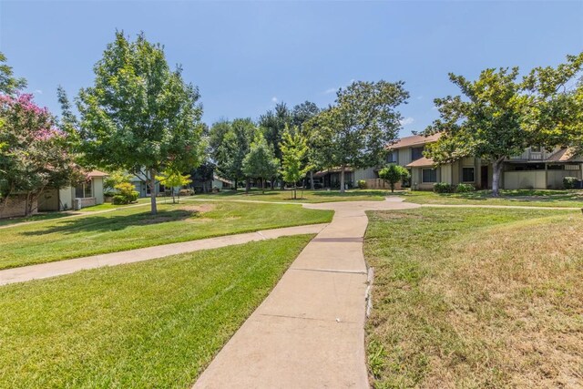 view of community featuring a lawn