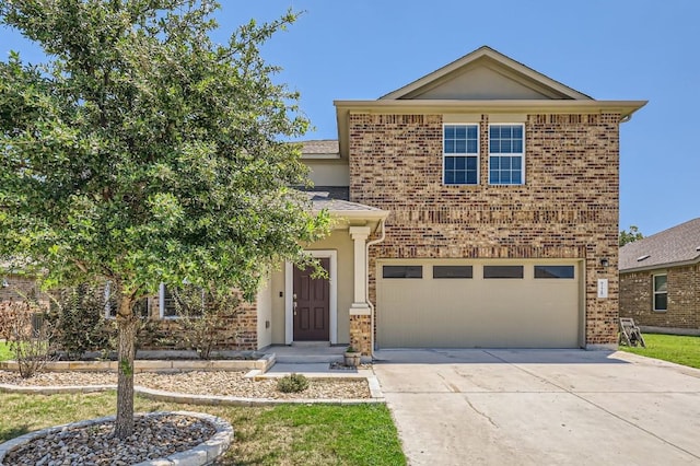 view of front property with a garage