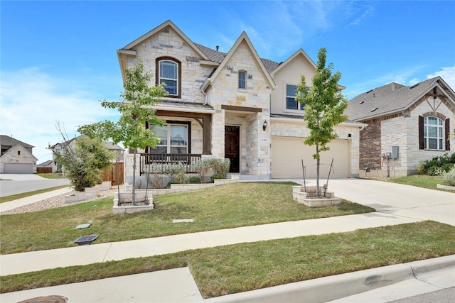 french country inspired facade featuring a front lawn and a garage